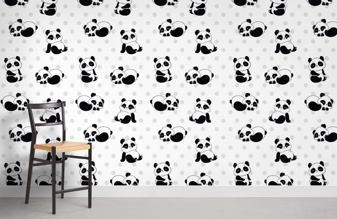 Cheerful Panda nursery wallpaper with polka dots, featuring a black wooden chair and grey flooring.