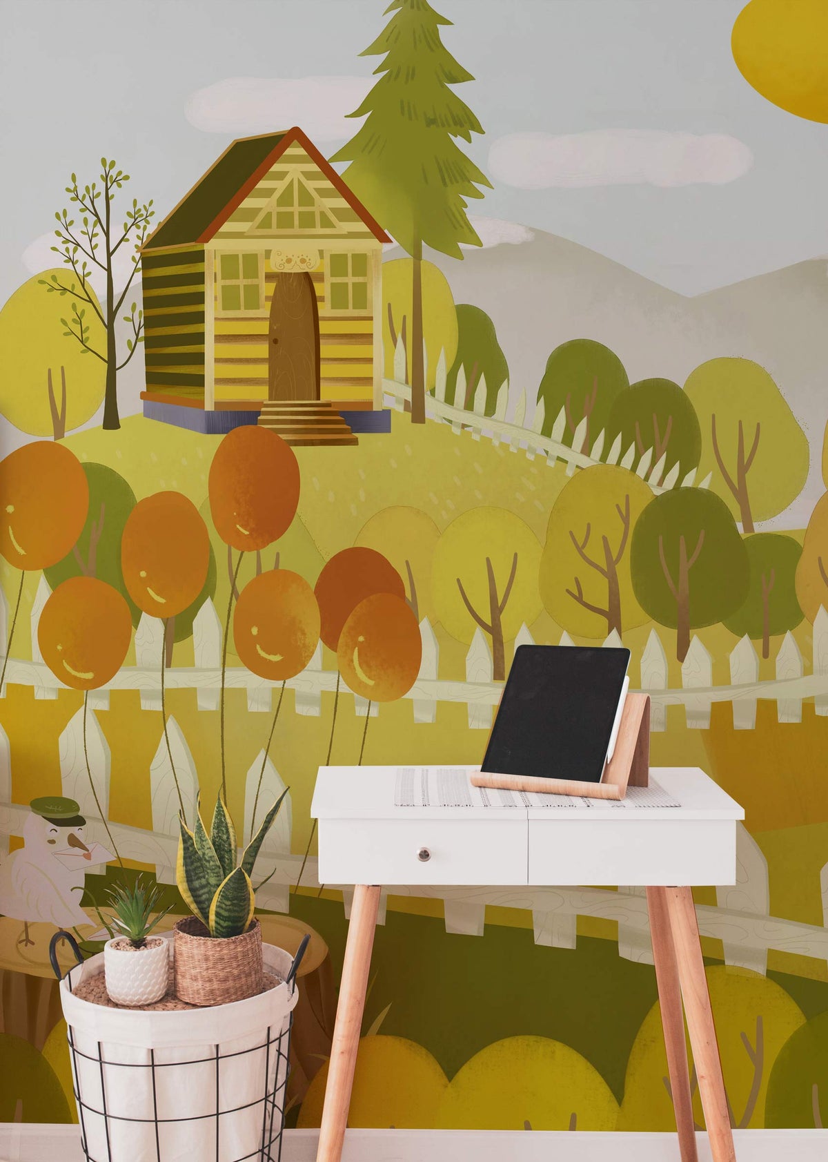Storybook Woodland Animals Mural Wallpaper, autumn colours, playful design, white desk, indoor setting.