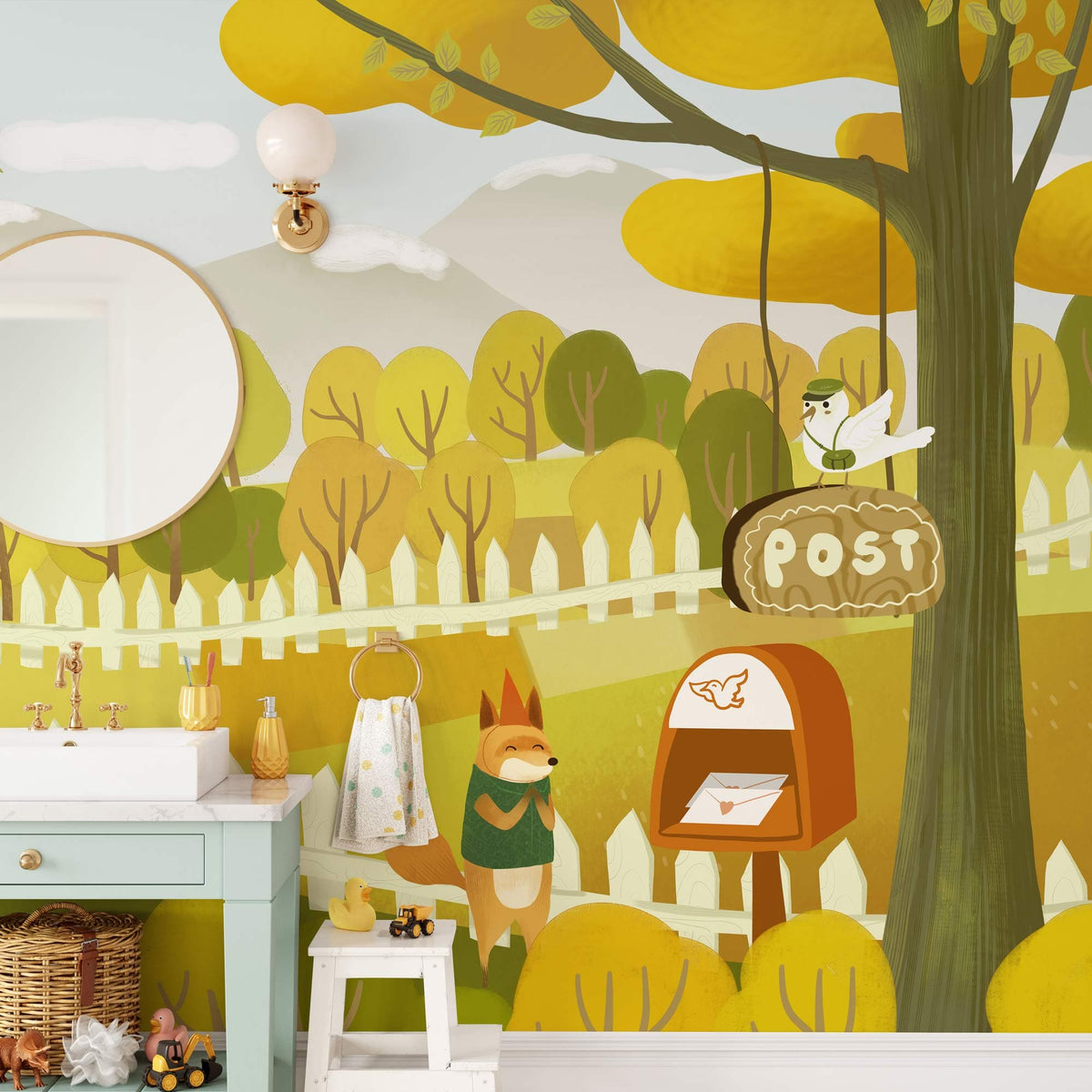 Woodland animals mural in autumn tones beside a mint vanity in child's bathroom with wall sconce.