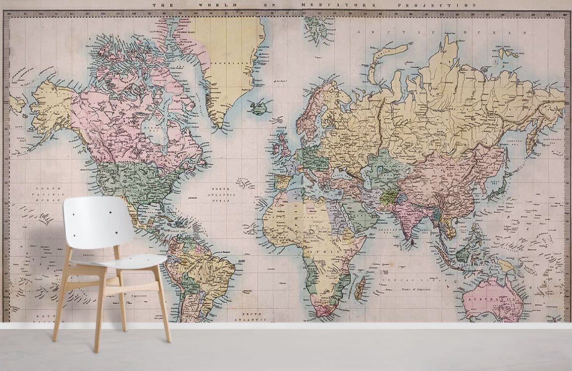 Vintage World Map Mural Wallpaper in sepia; minimalist white chair; light wood flooring; classic decor.