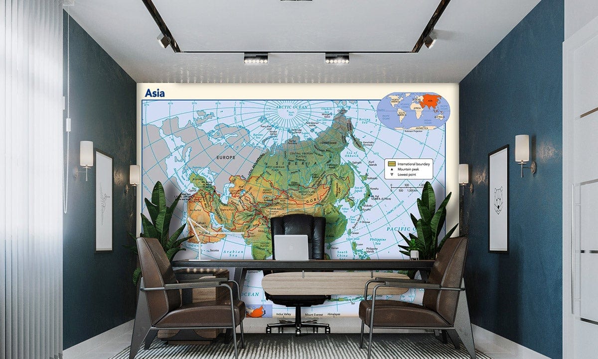 Vintage Asia Pacific map wallpaper in earthy tones, study room, modern chairs, patterned rug, blue walls.