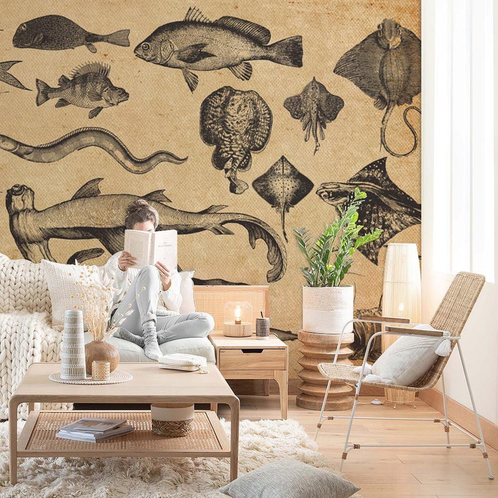 Vintage Oceanic Fauna Beige Nautical Wallpaper in cosy living room with modern sofa and wooden flooring.