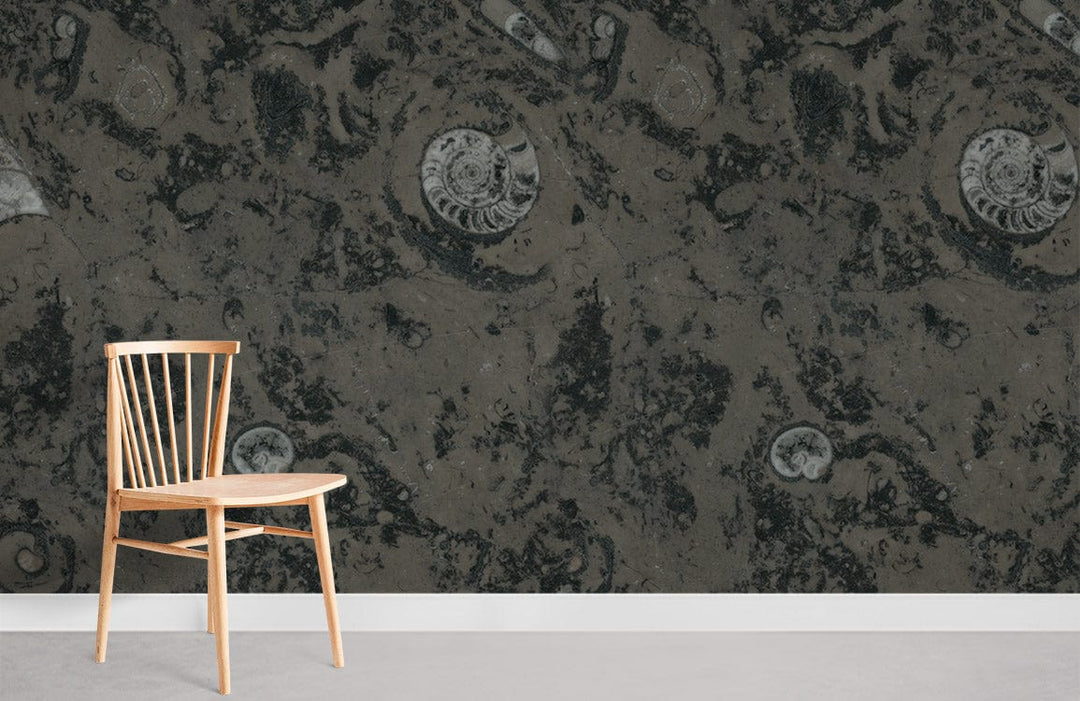 Wooden chair in room with Dark Fossil Swirl Patterned Wallpaper, grey floor, natural earth tones.