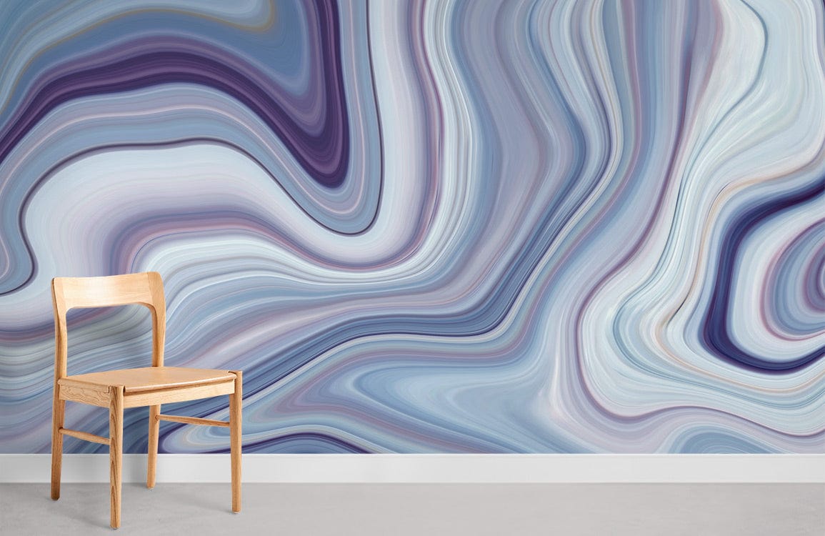 Wooden chair against swirling marble blue and purple abstract wallpaper mural in minimalistic room setting.
