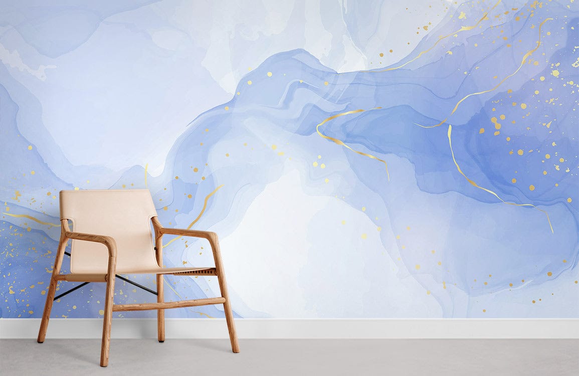 Dreamy Watercolour Blue Gold Marble Mural Wallpaper with beige chair and grey flooring in lounge setting.