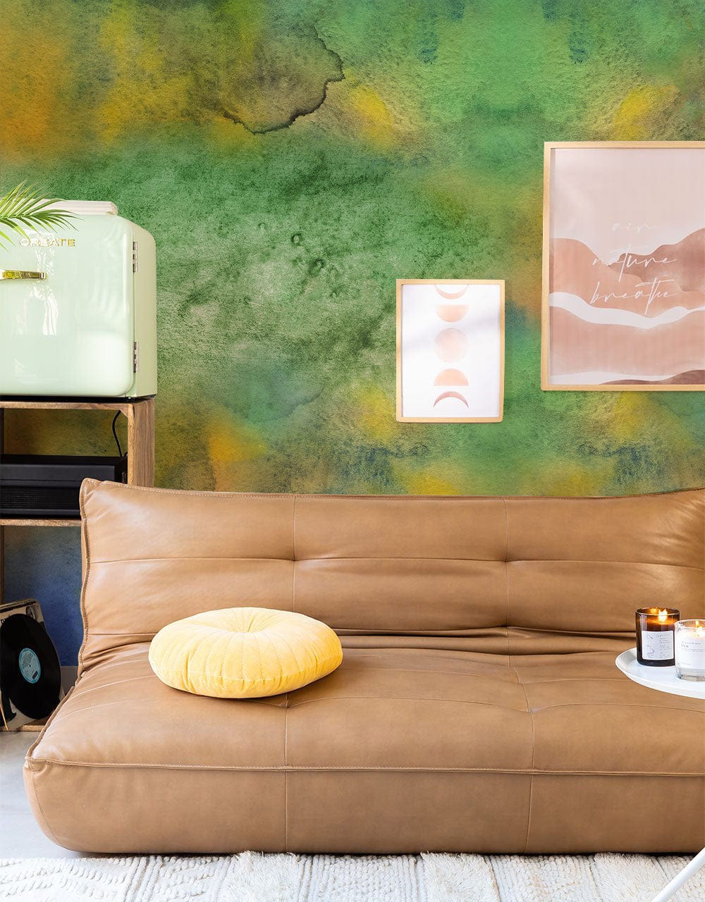 Brown leather sofa, abstract mural wallpaper, green fridge; Vibrant Watercolour Green and Blue Abstract Mural.