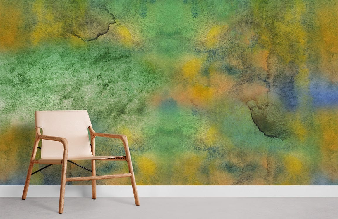 Vibrant watercolour mural wallpaper with beige wooden chair; green and blue abstract artistry in living room.