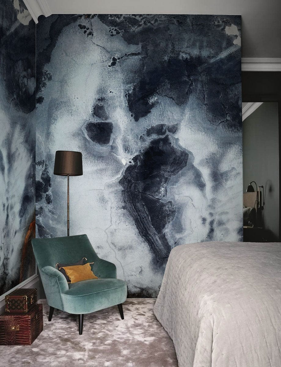 Abstract Monochrome Marble Mural Wallpaper, bedroom, green armchair, floor lamp, textured grey carpet.