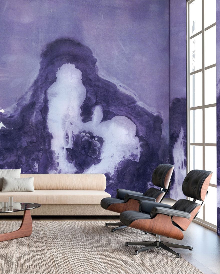 Purple abstract wall mural, cream sofa, leather chairs, textured rug, floor-to-ceiling window, artistic room.