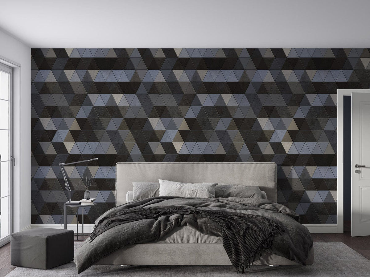 Geometric hexagon pattern wallpaper, grey and black in modern bedroom with beige upholstered bed.