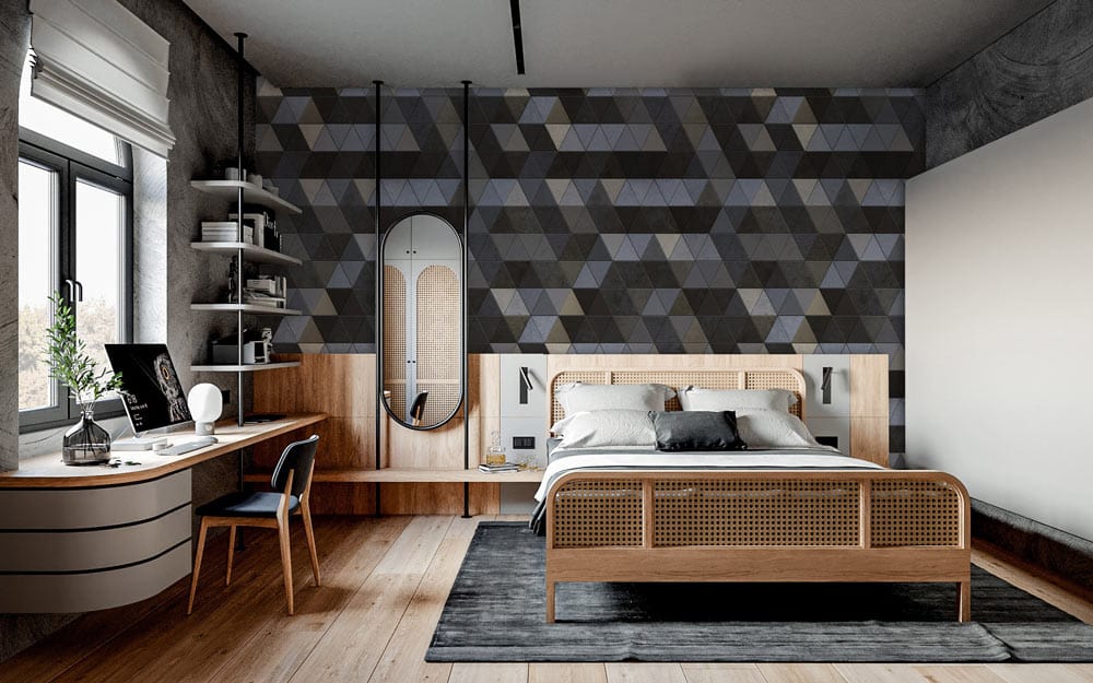Geometric hexagonal wallpaper in grey and black, modern bedroom design, wooden bed, desk, and chair.