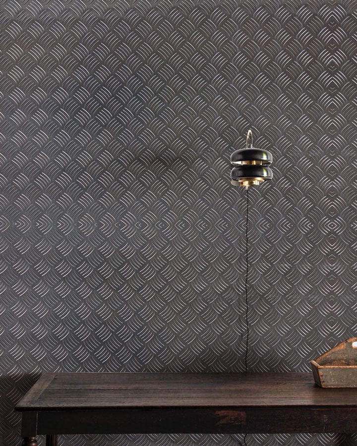 Industrial Chic grey wallpaper, textured pattern; dark wooden table, modern lighting fixture. Perfect for interiors.