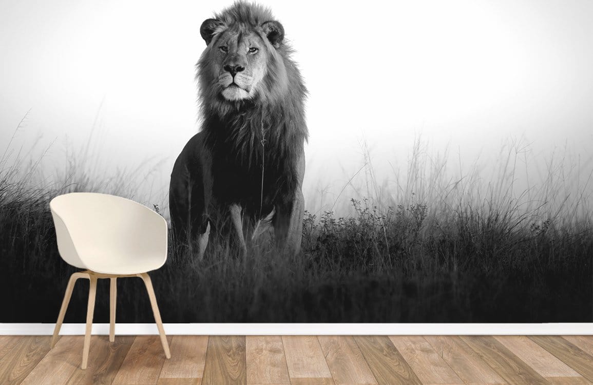 Monochrome Majestic Lion Safari Landscape Mural Wallpaper, white chair, wooden flooring, black-and-white theme.