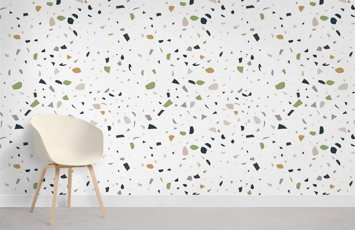 Modern green terrazzo wallpaper in stylish interior with minimalist white chair on grey flooring.