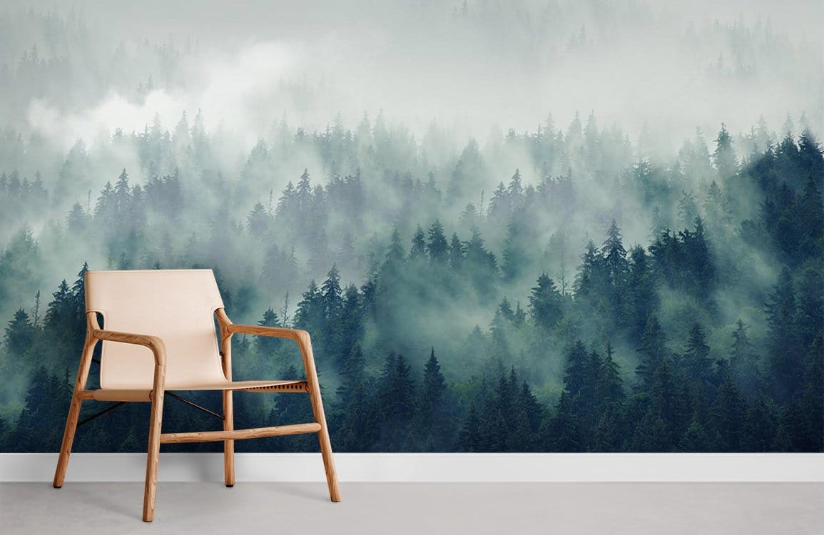 Misty Forest Green Scenic Mural Wallpaper with wooden chair, enhancing tranquil living space ambiance.