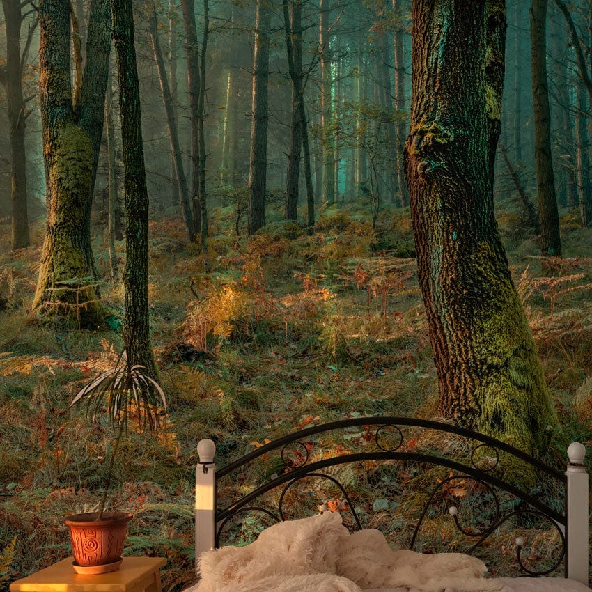 Misty Woodland Retreat mural wallpaper, featuring serene forest design, behind ornate bed frame in bedroom.