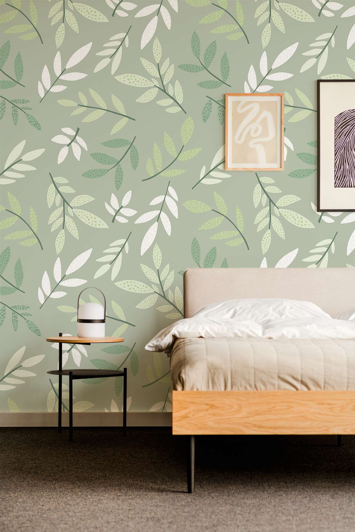 Tranquil green leaf wallpaper, beige bed, wooden bedside table, framed art, grey carpet flooring.