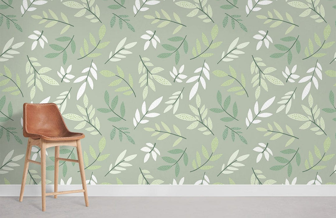 Tranquil Green Leaf Wallpaper in living room with brown modern chair and light grey flooring.