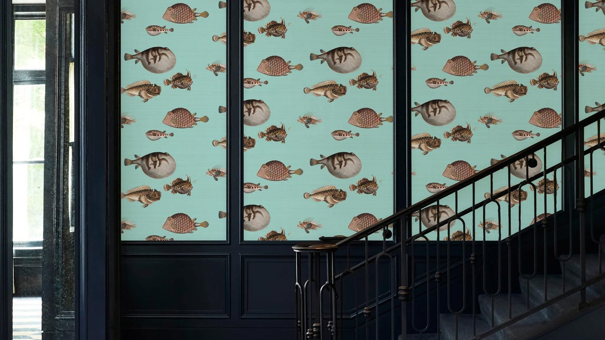 Vintage Aquatic Life Turquoise Fish Pattern Wallpaper enhances staircase; dark panelling exudes nautical style.