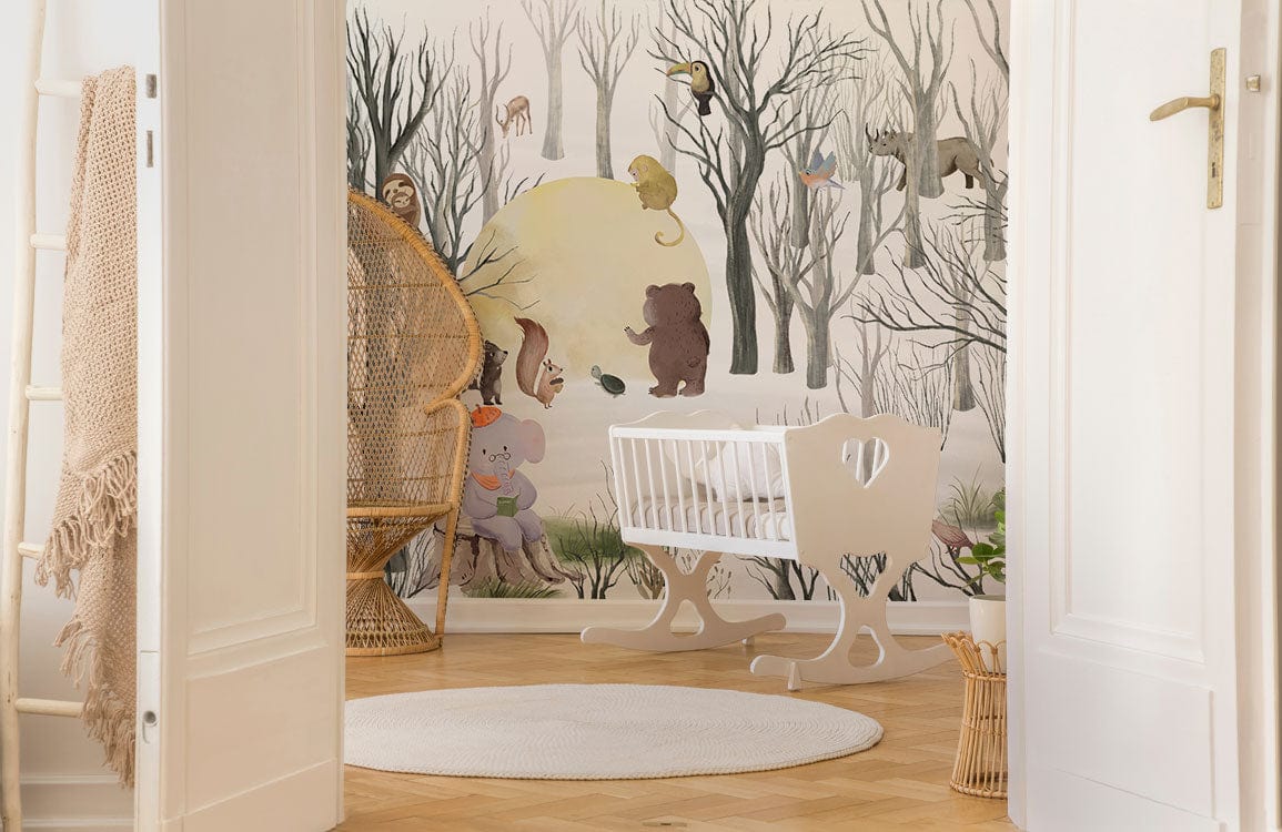 Enchanted Woodland Animals mural in nursery with wicker chair, cot, wooden flooring, pastel decor.