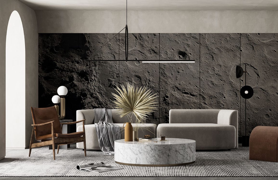 Textured Grey Moon Surface Mural Wallpaper in modern lounge with beige sofa, dark armchair, round marble table.