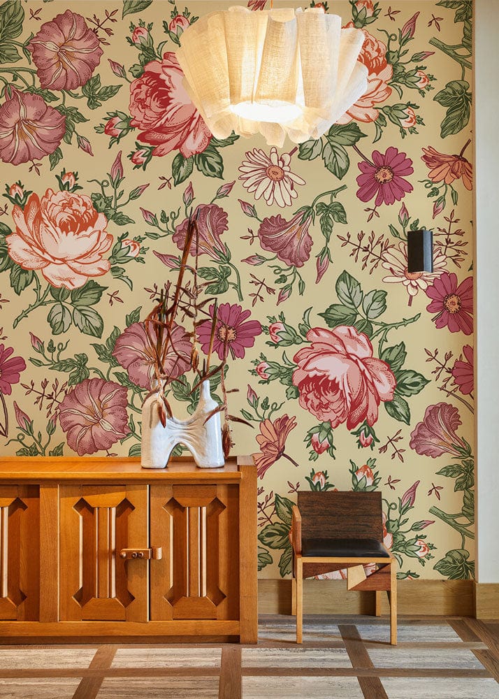 Vintage floral wallpaper with pastel roses, wooden cabinet, modern ceiling light, brown chair, classic interior.