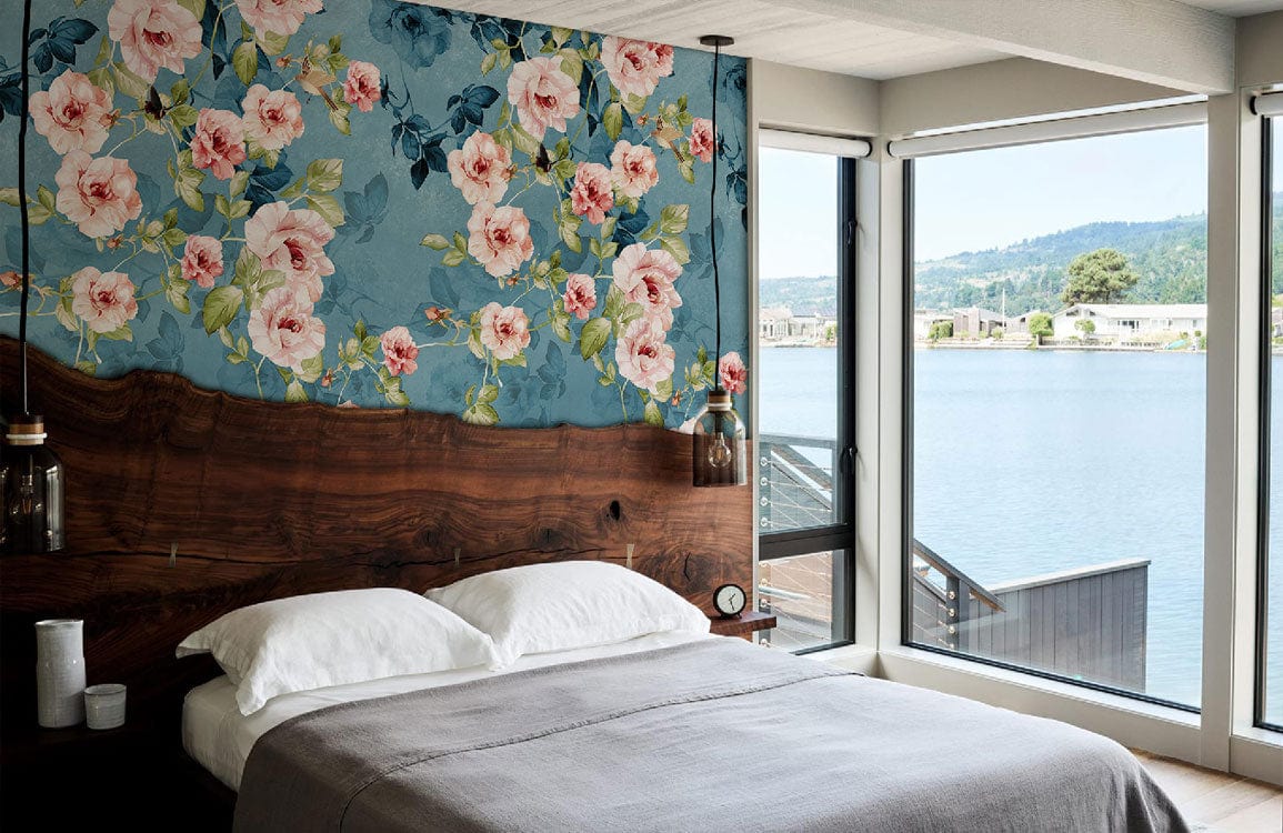 Cozy bedroom with floral wallpaper, grey bedding, panoramic lake view, and stylish modern decor.