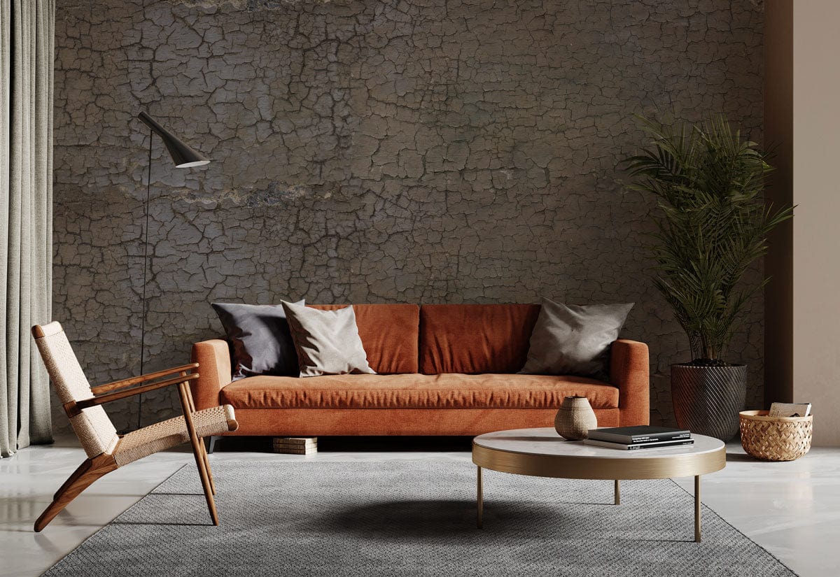 Vintage rustic crackle effect wallpaper in living room with brown sofa, wooden chair, grey rug.