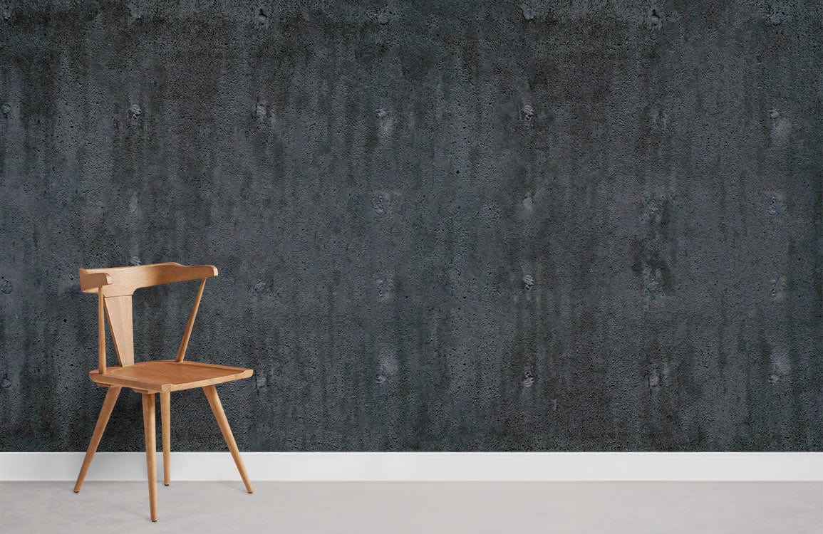 Industrial charcoal concrete wallpaper with wooden chair in modern room, light grey floor complements style.