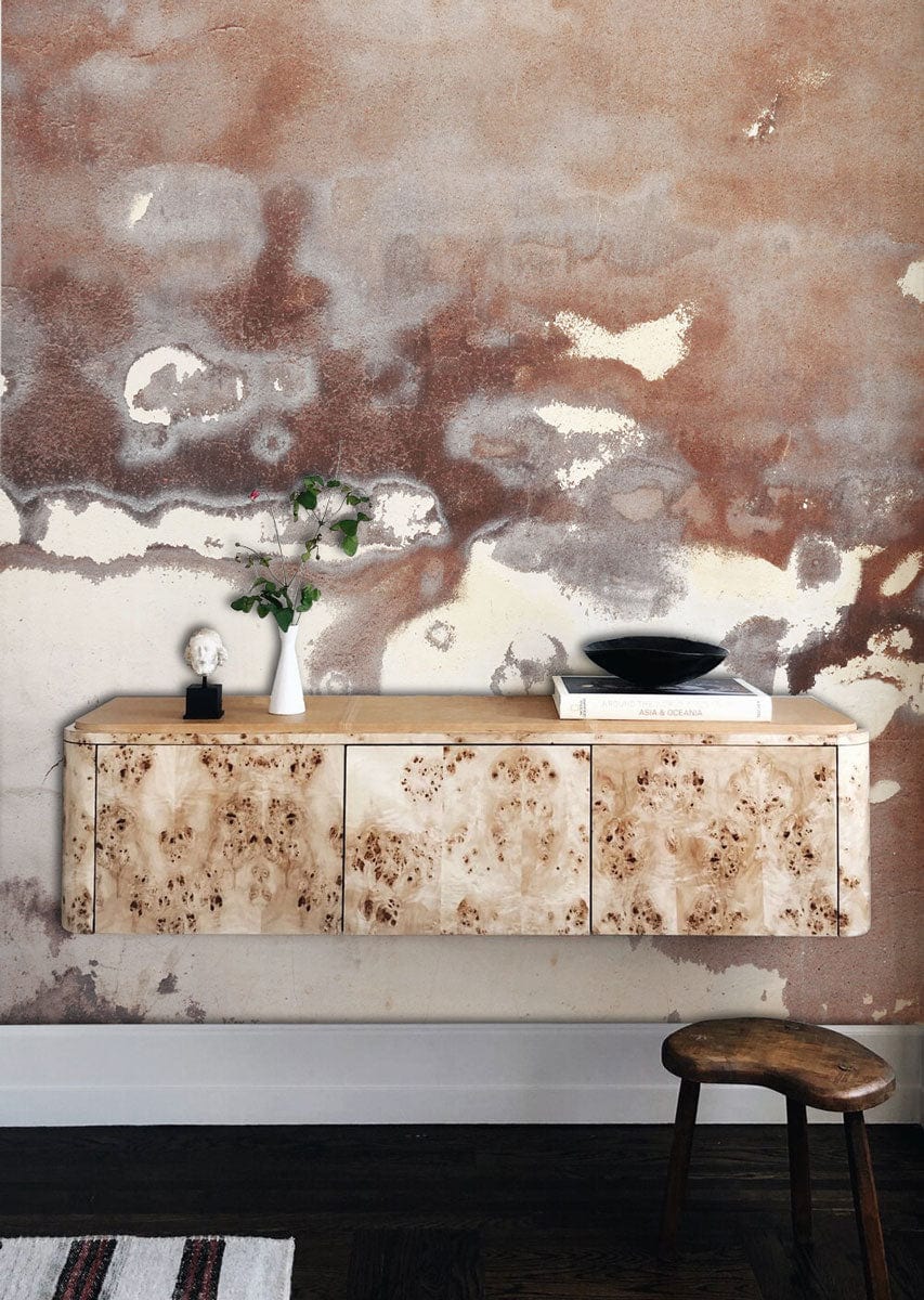 Vintage Aged Abstract Wallpaper featuring brown, cream tones; rustic wall art; wooden sideboard, dark flooring.