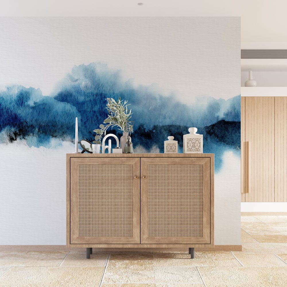Elegant blue watercolour mural wallpaper with contemporary cabinet; modern interior design, beige tiled flooring.