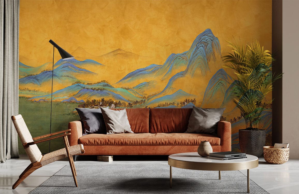 Golden Tranquility mural with blue mountains, brown sofa, modern lamp, grey floor, lush indoor plant.