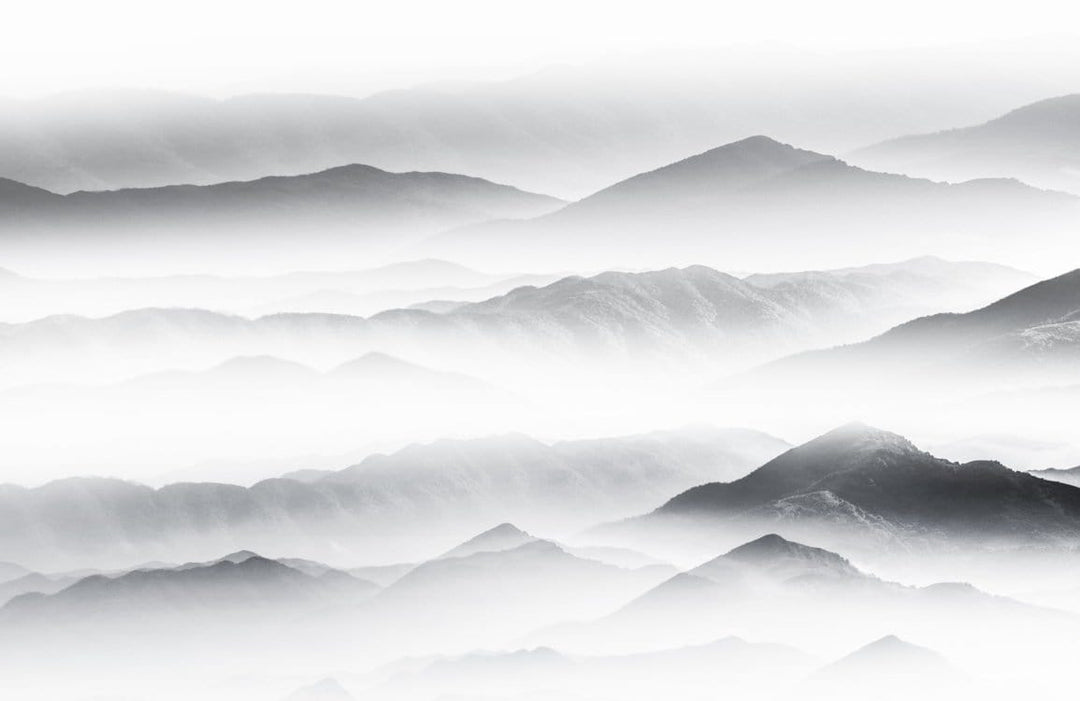 Serene Misty Mountain Landscape Mural Wallpaper in Grey and White Tones