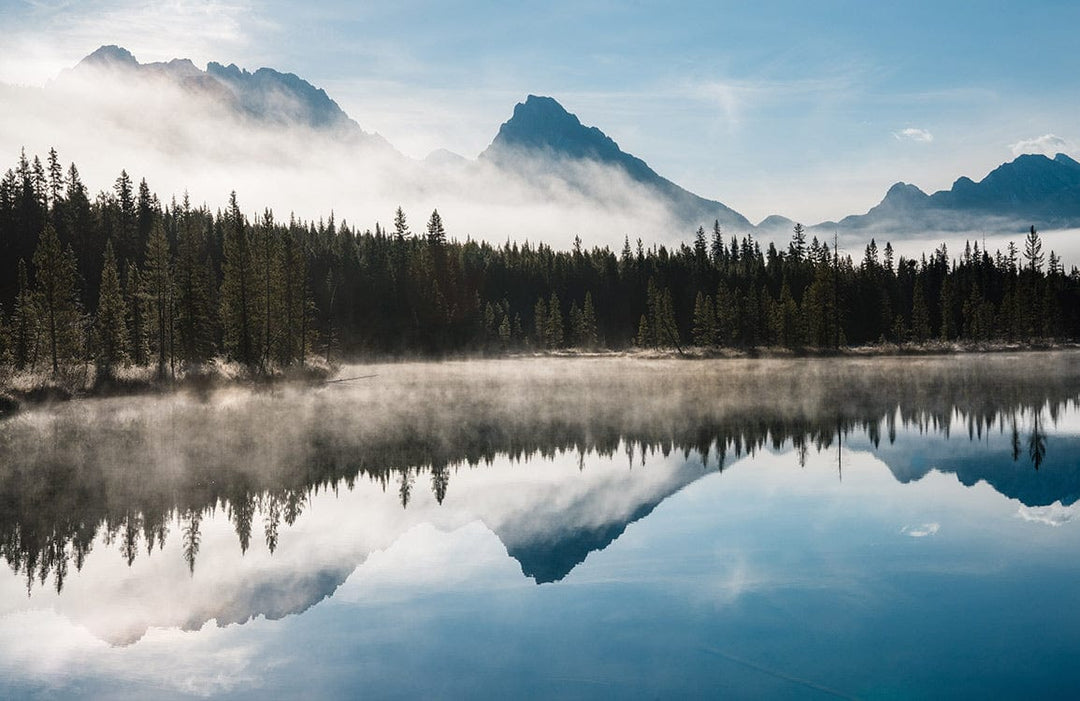 Tranquil Misty Mountain Lake Scenic Mural Wallpaper in Serene Blues and Greens