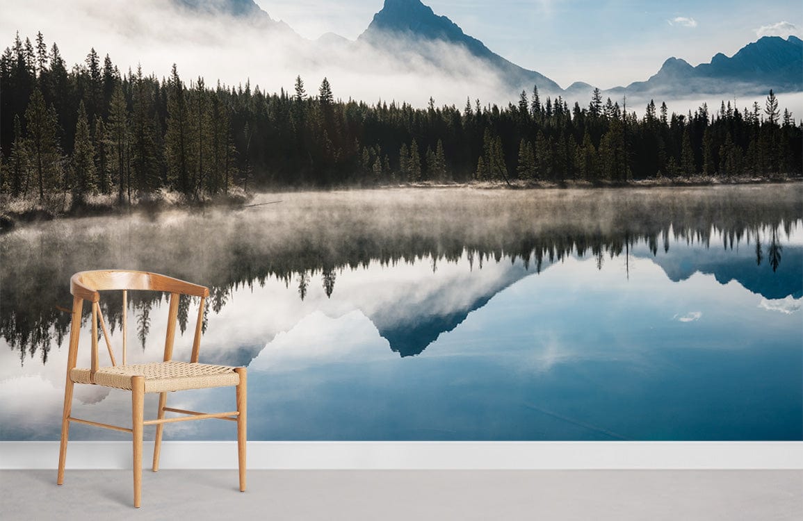Tranquil Misty Mountain Lake Scenic Mural Wallpaper with wooden chair, neutral flooring, serene room setting.