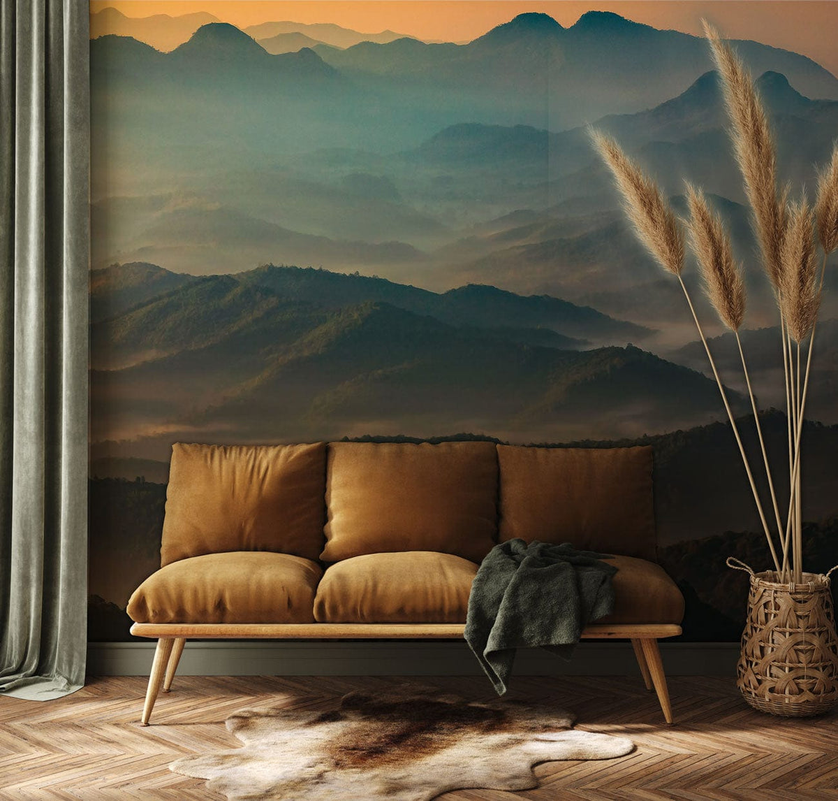 Serene misty mountain mural wallpaper with tan sofa, herringbone flooring, and textured decor in stylish room.
