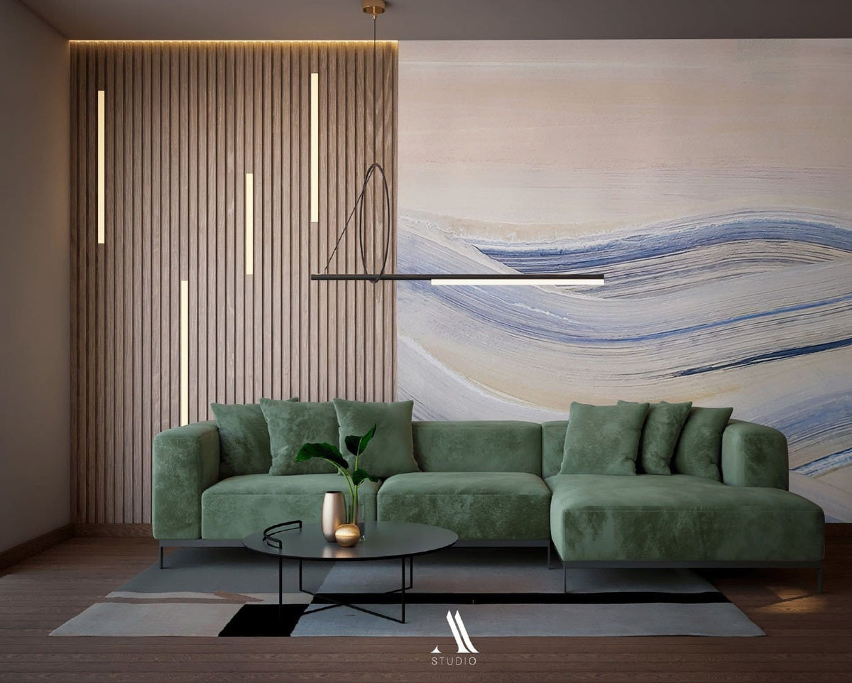 Green sofa, wooden feature wall, modern pendant light complementing Serene Coastal Waves wallpaper, soft blue.