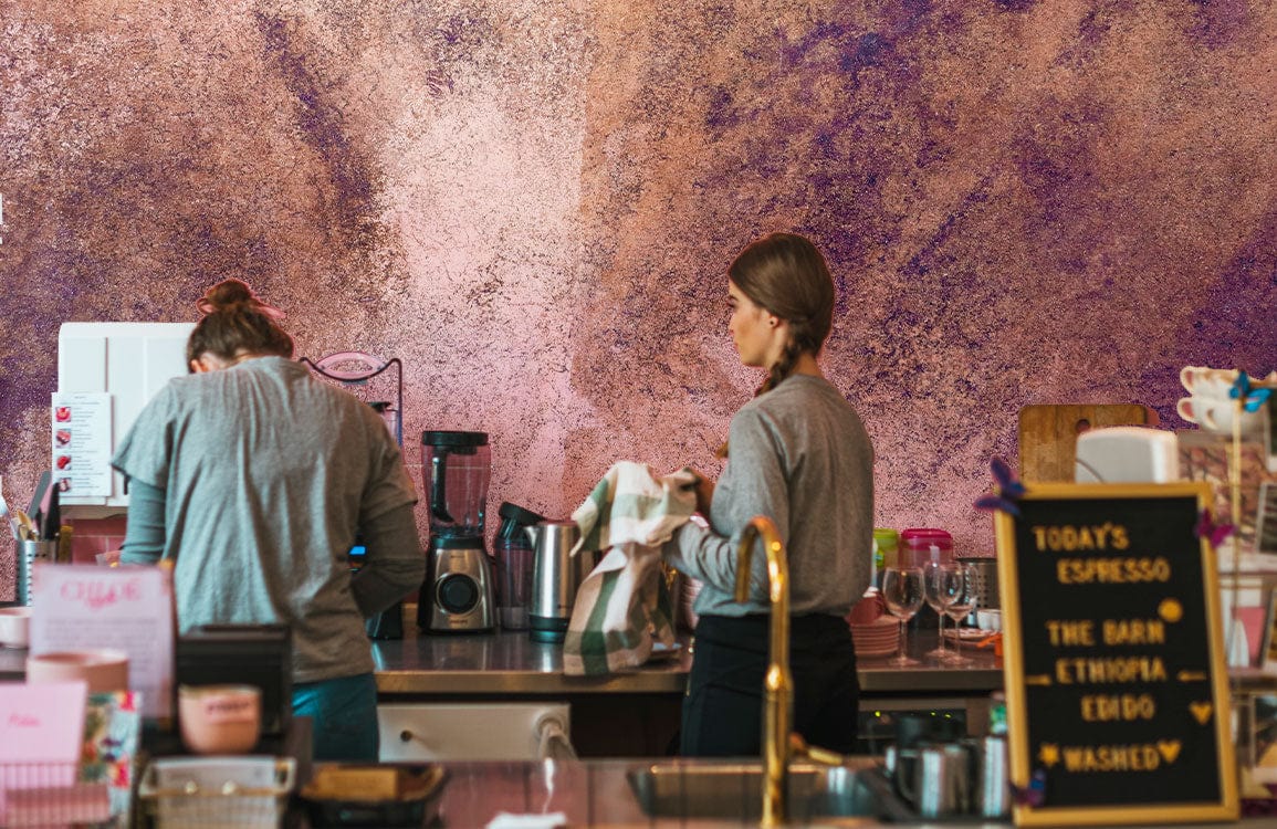 Modern kitchen featuring Abstract Purple and Brown Rustic Textured Mural Wallpaper Design with barista equipment.
