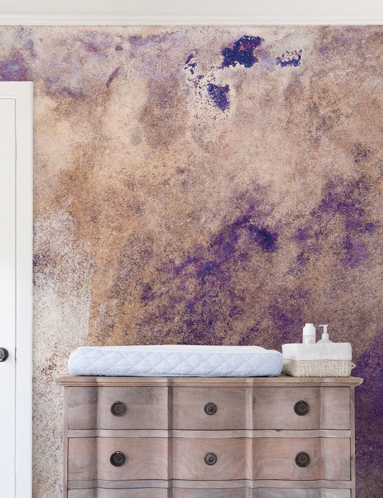Abstract Purple and Brown Rustic Textured Mural Wallpaper Design in nursery with wooden dresser.