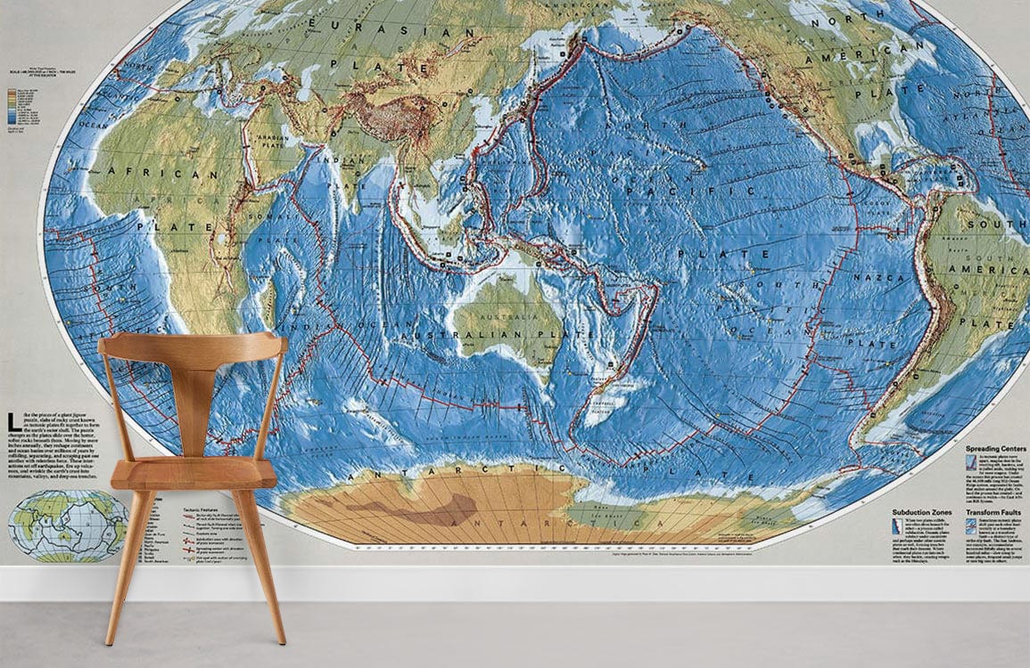 Vintage Earth map mural in natural tones, wooden chair, grey flooring, educational decor.