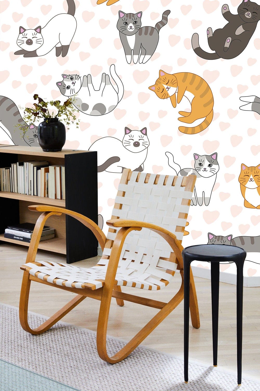 Charming Cats Heart Pattern Wallpaper, cartoon style; light wood chair, modern shelf, wooden flooring.