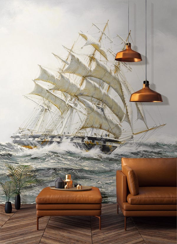 Vintage Nautical Sailing Ship Mural Wallpaper with leather sofa, wooden flooring, copper lights in lounge.
