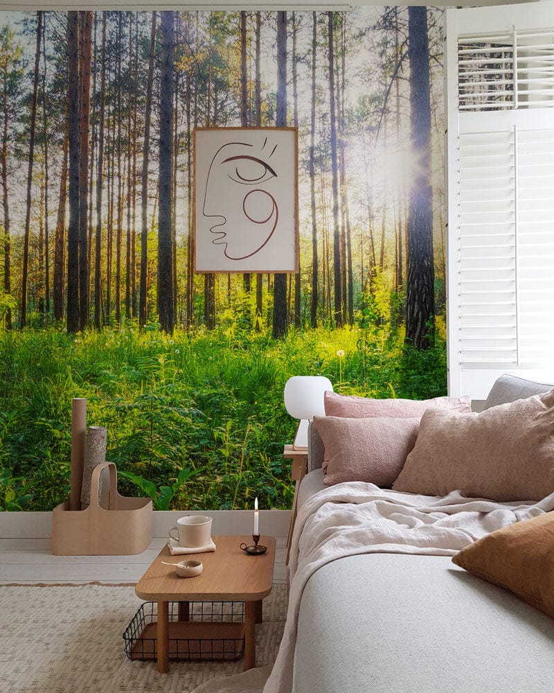 Sunlit Forest Tranquillity Wallpaper in living room, beige sofa, wooden coffee table, abstract wall art.