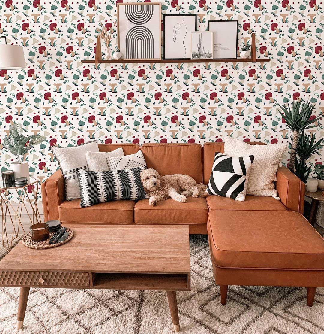 Whimsical animal forest wallpaper, muted rustic colours, brown leather sofa, wooden coffee table, modern decor.