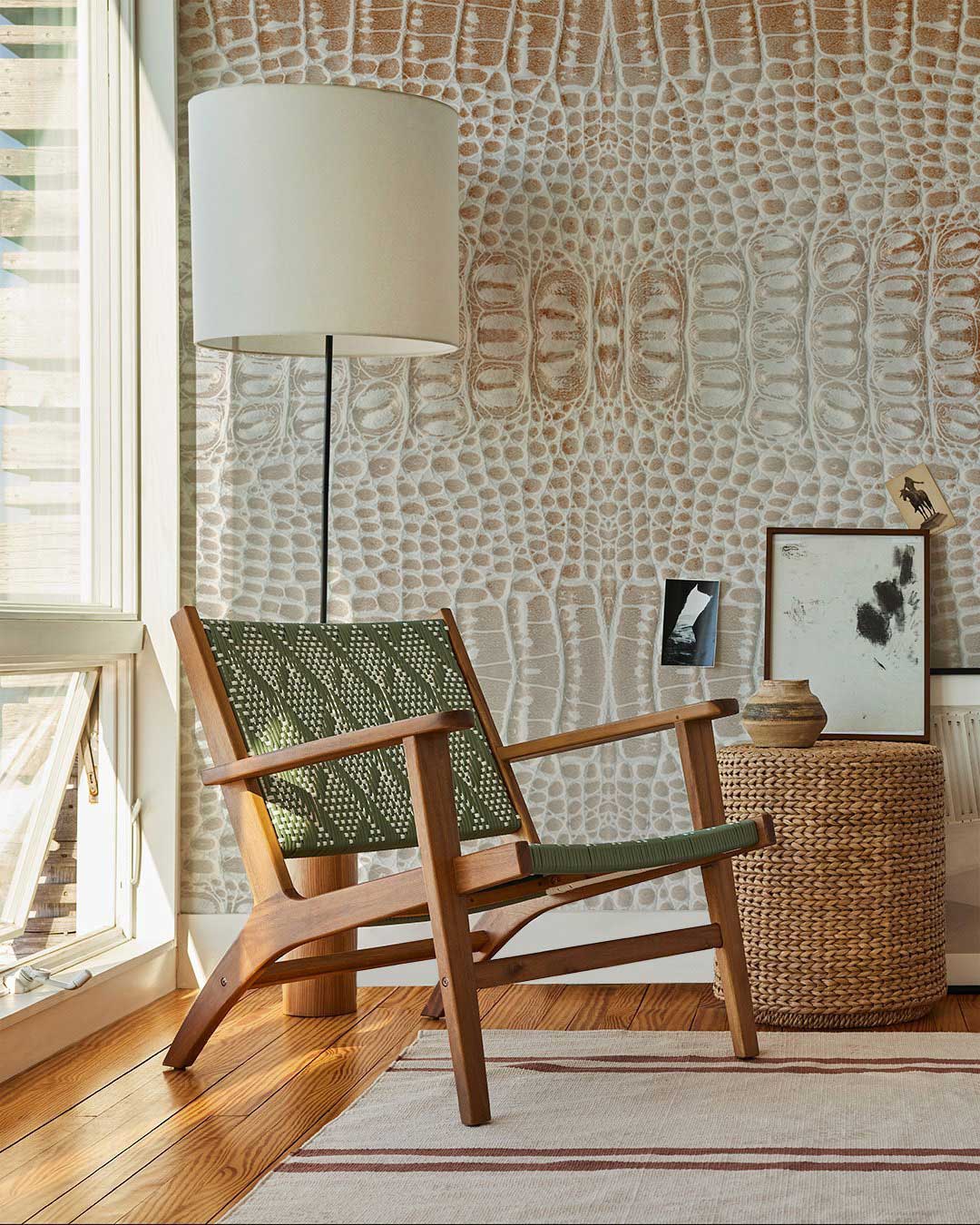 Luxe Beige Crocodile Textured Wallpaper in elegant living room with wooden chair and light wood flooring.