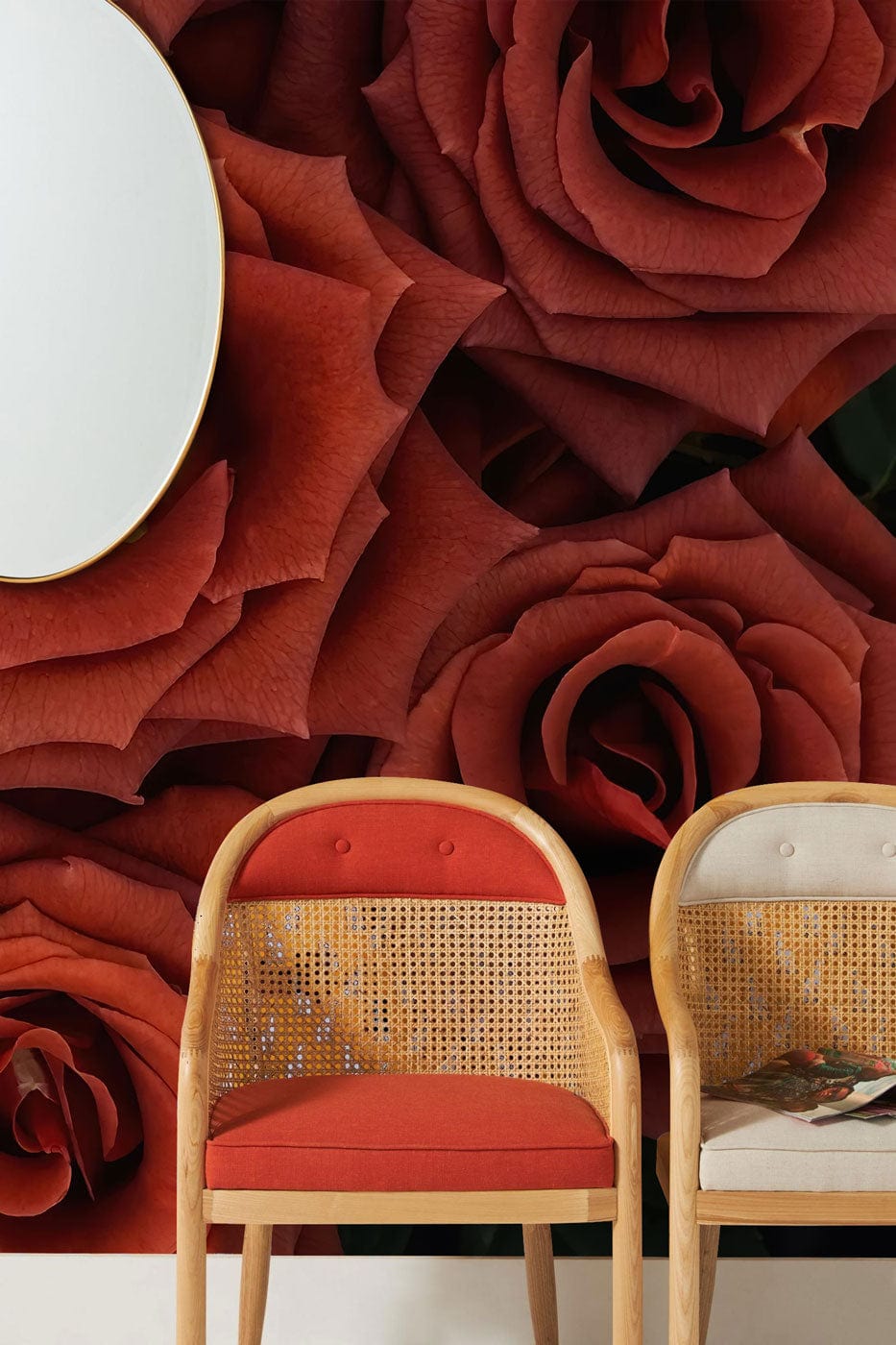 Luxurious deep red rose wallpaper with elegant design, featuring wooden chairs and decorative mirror.