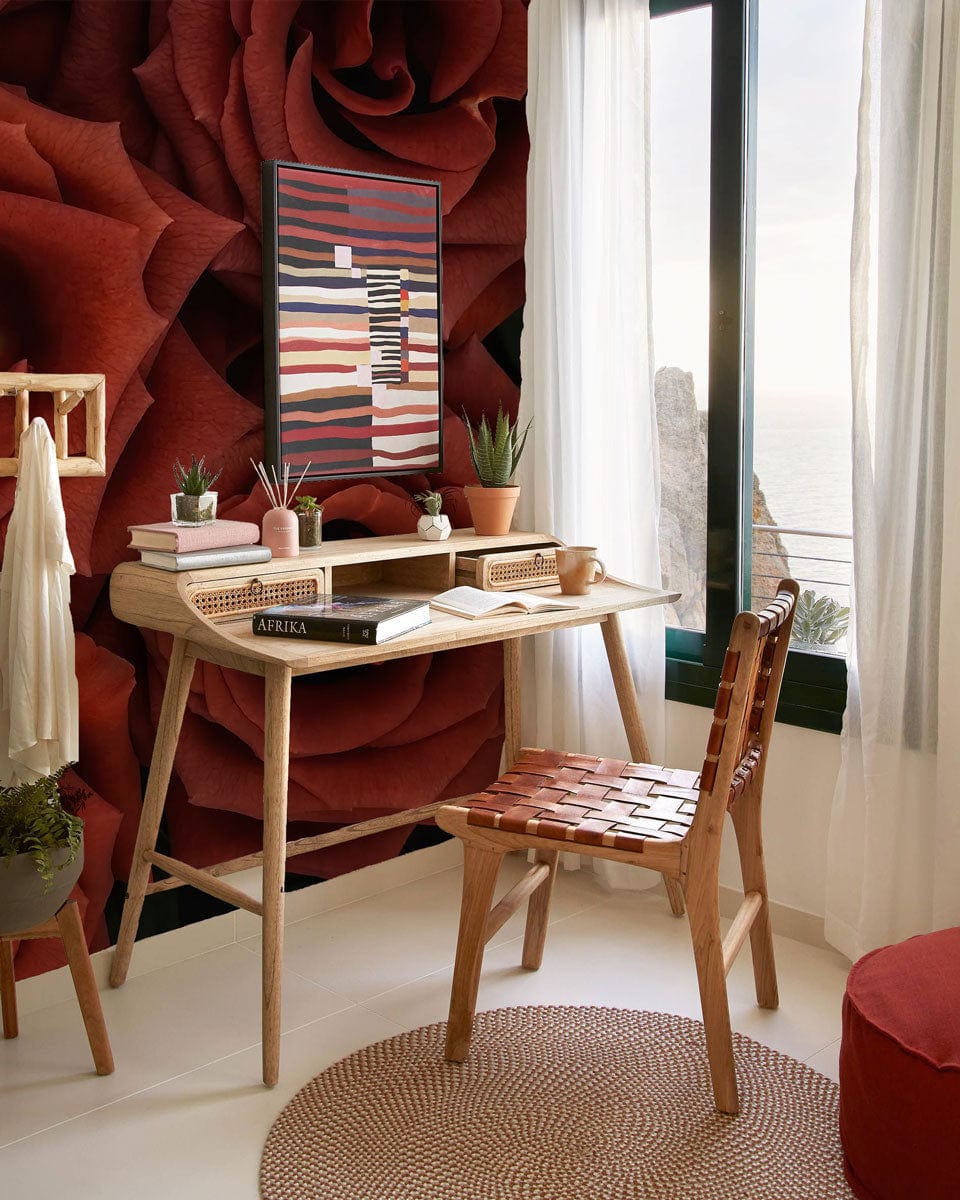 Luxurious deep red rose wallpaper in study room with wooden desk and chair, beige flooring.