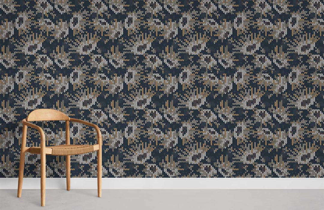Elegant geometric patterned wallpaper in navy and gold with wooden chair and concrete flooring.