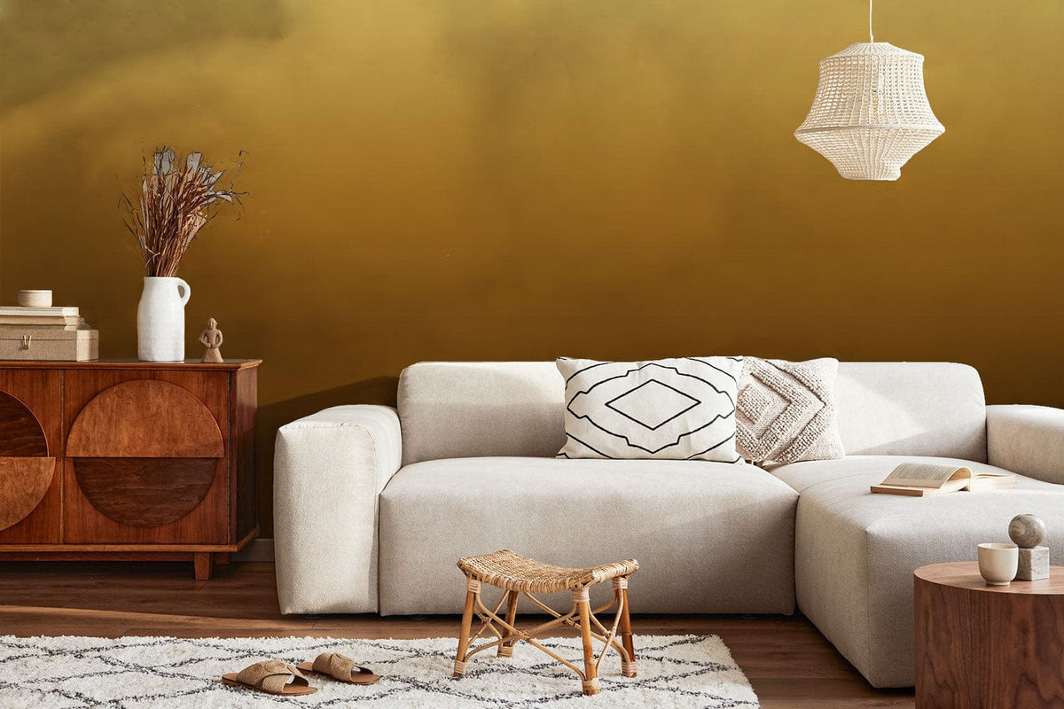 Elegant Golden Ombre Wallpaper in Contemporary Lounge with Beige Sofa, Wooden Sideboard, and Pendant Light.