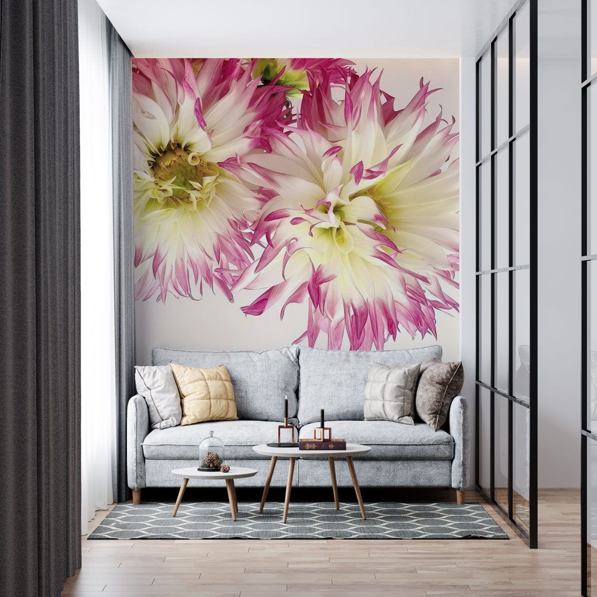 Vibrant pink and white dahlia wallpaper with grey sofa, wooden flooring, and geometric rug in living room.